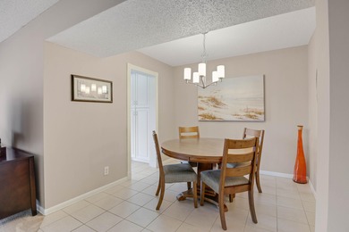 WELCOME TO THIS SPARKLING CONDO WITH EXPANSIVE GOLF VIEWS FROM A on Poinciana Golf Club in Florida - for sale on GolfHomes.com, golf home, golf lot