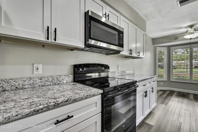 Beautiful Oakmont Model Villa with Open Floor Plan & Stunning on Timber Pines Golf Course in Florida - for sale on GolfHomes.com, golf home, golf lot