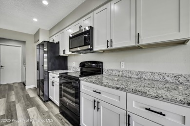 Beautiful Oakmont Model Villa with Open Floor Plan & Stunning on Timber Pines Golf Course in Florida - for sale on GolfHomes.com, golf home, golf lot