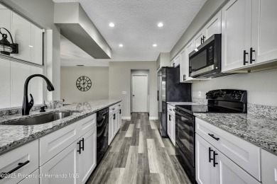 Beautiful Oakmont Model Villa with Open Floor Plan & Stunning on Timber Pines Golf Course in Florida - for sale on GolfHomes.com, golf home, golf lot