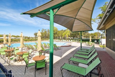 Beautiful Oakmont Model Villa with Open Floor Plan & Stunning on Timber Pines Golf Course in Florida - for sale on GolfHomes.com, golf home, golf lot