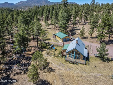 This one-of-a-kind home is located on an acre of beautiful on Alpine Country Club in Arizona - for sale on GolfHomes.com, golf home, golf lot