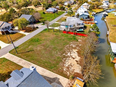 Beautiful cleared waterfront lot! Located in Pass Christian's on Pass Christian Isles Golf Club in Mississippi - for sale on GolfHomes.com, golf home, golf lot