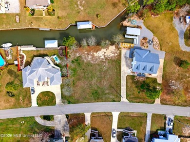 Beautiful cleared waterfront lot! Located in Pass Christian's on Pass Christian Isles Golf Club in Mississippi - for sale on GolfHomes.com, golf home, golf lot