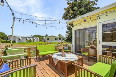 Enjoy outdoor entertaining? This home is tucked away on a on Riviera Golf Club in Florida - for sale on GolfHomes.com, golf home, golf lot