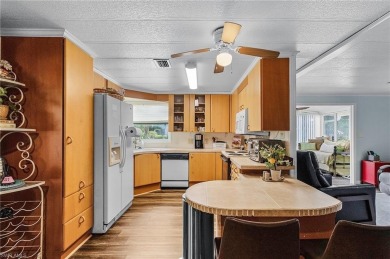 Enjoy outdoor entertaining? This home is tucked away on a on Riviera Golf Club in Florida - for sale on GolfHomes.com, golf home, golf lot