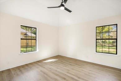 Welcome to this beautifully renovated home nestled in the heart on Pecan Plantation Country Club in Texas - for sale on GolfHomes.com, golf home, golf lot