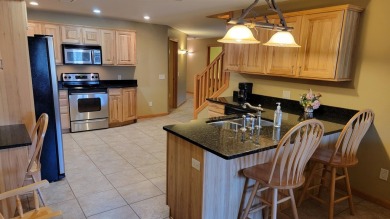 Stunning 4 bed/3 bath turn-key condo in Sunset Condos at on Northern Bay Golf Resort and Marina in Wisconsin - for sale on GolfHomes.com, golf home, golf lot