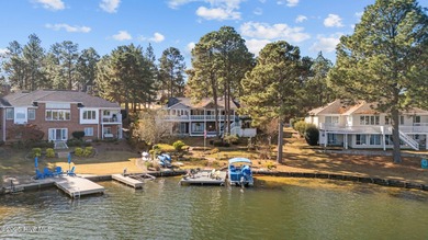 Lakefront living at its finest on the highly desirable Lake on Beacon Ridge Golf and Country Club in North Carolina - for sale on GolfHomes.com, golf home, golf lot