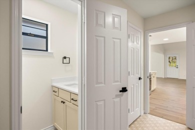 Welcome to this beautifully renovated home nestled in the heart on Pecan Plantation Country Club in Texas - for sale on GolfHomes.com, golf home, golf lot