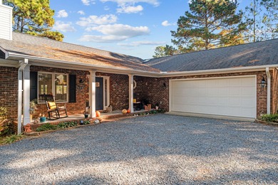 Lakefront living at its finest on the highly desirable Lake on Beacon Ridge Golf and Country Club in North Carolina - for sale on GolfHomes.com, golf home, golf lot