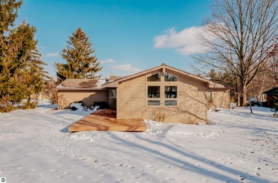 Usually, you have to choose between a golf course setting, water on Grand Traverse Resort and Spa in Michigan - for sale on GolfHomes.com, golf home, golf lot