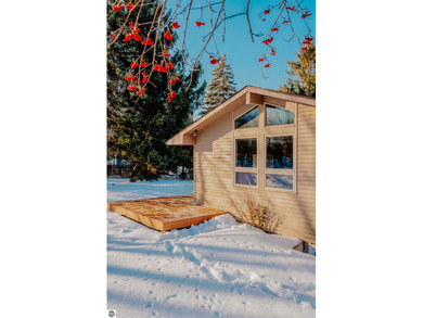 Usually, you have to choose between a golf course setting, water on Grand Traverse Resort and Spa in Michigan - for sale on GolfHomes.com, golf home, golf lot