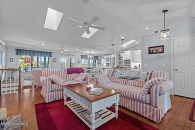 Lakefront living at its finest on the highly desirable Lake on Beacon Ridge Golf and Country Club in North Carolina - for sale on GolfHomes.com, golf home, golf lot