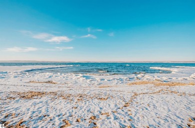 Usually, you have to choose between a golf course setting, water on Grand Traverse Resort and Spa in Michigan - for sale on GolfHomes.com, golf home, golf lot