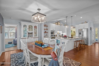 Lakefront living at its finest on the highly desirable Lake on Beacon Ridge Golf and Country Club in North Carolina - for sale on GolfHomes.com, golf home, golf lot