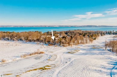 Usually, you have to choose between a golf course setting, water on Grand Traverse Resort and Spa in Michigan - for sale on GolfHomes.com, golf home, golf lot