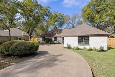 Welcome to this beautifully renovated home nestled in the heart on Pecan Plantation Country Club in Texas - for sale on GolfHomes.com, golf home, golf lot