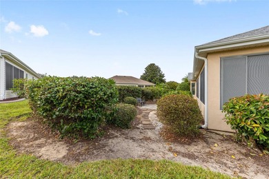 First time on the market! This charming 2-bedroom, 2-bath on Eagle Ridge At Spruce Creek Country Club in Florida - for sale on GolfHomes.com, golf home, golf lot