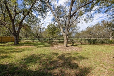 Welcome to this beautifully renovated home nestled in the heart on Pecan Plantation Country Club in Texas - for sale on GolfHomes.com, golf home, golf lot