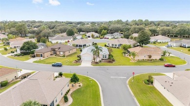 First time on the market! This charming 2-bedroom, 2-bath on Eagle Ridge At Spruce Creek Country Club in Florida - for sale on GolfHomes.com, golf home, golf lot