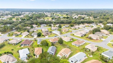 First time on the market! This charming 2-bedroom, 2-bath on Eagle Ridge At Spruce Creek Country Club in Florida - for sale on GolfHomes.com, golf home, golf lot