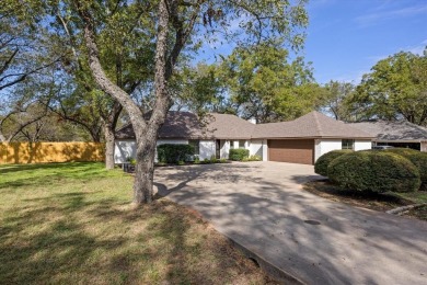Welcome to this beautifully renovated home nestled in the heart on Pecan Plantation Country Club in Texas - for sale on GolfHomes.com, golf home, golf lot
