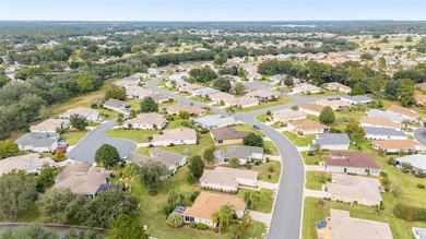 First time on the market! This charming 2-bedroom, 2-bath on Eagle Ridge At Spruce Creek Country Club in Florida - for sale on GolfHomes.com, golf home, golf lot