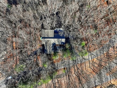 Enjoy breathtaking, long-range Blue Ridge Mountain views from on Big Canoe Golf Club - Cherokee in Georgia - for sale on GolfHomes.com, golf home, golf lot