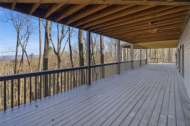 Enjoy breathtaking, long-range Blue Ridge Mountain views from on Big Canoe Golf Club - Cherokee in Georgia - for sale on GolfHomes.com, golf home, golf lot