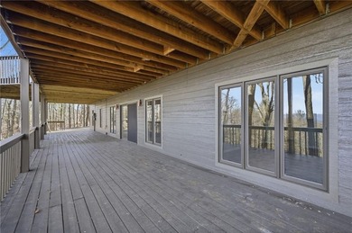 Enjoy breathtaking, long-range Blue Ridge Mountain views from on Big Canoe Golf Club - Cherokee in Georgia - for sale on GolfHomes.com, golf home, golf lot