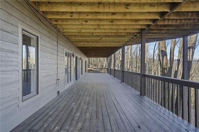 Enjoy breathtaking, long-range Blue Ridge Mountain views from on Big Canoe Golf Club - Cherokee in Georgia - for sale on GolfHomes.com, golf home, golf lot