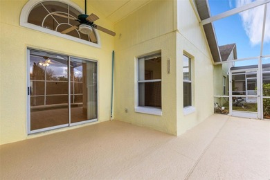 This beautiful POOL home is located in a gated, golf course on Ridgewood Lakes Golf and Country Club in Florida - for sale on GolfHomes.com, golf home, golf lot