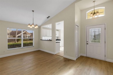 This beautiful POOL home is located in a gated, golf course on Ridgewood Lakes Golf and Country Club in Florida - for sale on GolfHomes.com, golf home, golf lot