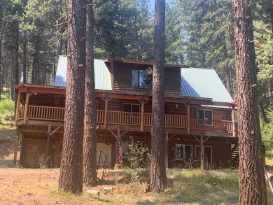 Explore the allure of log cabin living in this charming home on Meadowcreek Golf Resort in Idaho - for sale on GolfHomes.com, golf home, golf lot