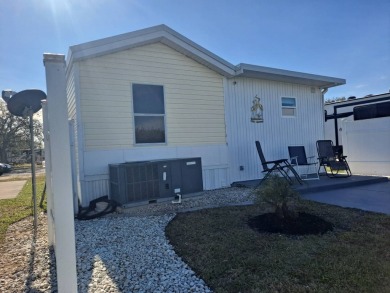 This Home Is Immaculate in Everyway ! Situated Right On the Lake on Riverwood Golf Club in Florida - for sale on GolfHomes.com, golf home, golf lot