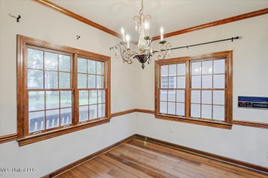Discover this spacious 4-Bedroom, 2.5-bath home with at least on Castlewoods Golf Club in Mississippi - for sale on GolfHomes.com, golf home, golf lot