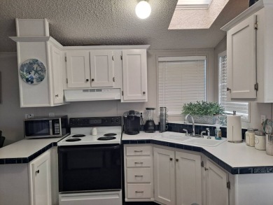 This Home Is Immaculate in Everyway ! Situated Right On the Lake on Riverwood Golf Club in Florida - for sale on GolfHomes.com, golf home, golf lot