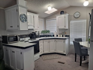 This Home Is Immaculate in Everyway ! Situated Right On the Lake on Riverwood Golf Club in Florida - for sale on GolfHomes.com, golf home, golf lot