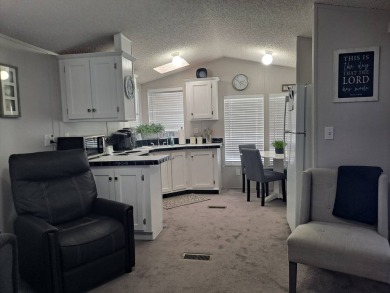 This Home Is Immaculate in Everyway ! Situated Right On the Lake on Riverwood Golf Club in Florida - for sale on GolfHomes.com, golf home, golf lot