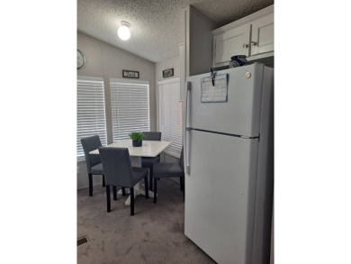 This Home Is Immaculate in Everyway ! Situated Right On the Lake on Riverwood Golf Club in Florida - for sale on GolfHomes.com, golf home, golf lot