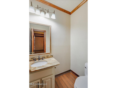 Discover this spacious 4-Bedroom, 2.5-bath home with at least on Castlewoods Golf Club in Mississippi - for sale on GolfHomes.com, golf home, golf lot