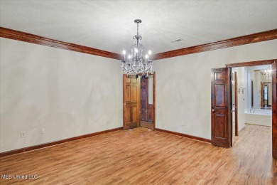 Discover this spacious 4-Bedroom, 2.5-bath home with at least on Castlewoods Golf Club in Mississippi - for sale on GolfHomes.com, golf home, golf lot