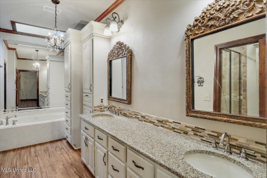 Discover this spacious 4-Bedroom, 2.5-bath home with at least on Castlewoods Golf Club in Mississippi - for sale on GolfHomes.com, golf home, golf lot