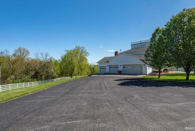 Embracing the charm of Southern architecture, this estate boasts on Stone Crest Golf Community in Indiana - for sale on GolfHomes.com, golf home, golf lot