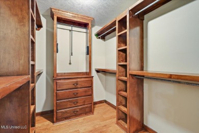 Discover this spacious 4-Bedroom, 2.5-bath home with at least on Castlewoods Golf Club in Mississippi - for sale on GolfHomes.com, golf home, golf lot