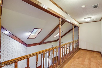 Discover this spacious 4-Bedroom, 2.5-bath home with at least on Castlewoods Golf Club in Mississippi - for sale on GolfHomes.com, golf home, golf lot