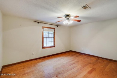 Discover this spacious 4-Bedroom, 2.5-bath home with at least on Castlewoods Golf Club in Mississippi - for sale on GolfHomes.com, golf home, golf lot