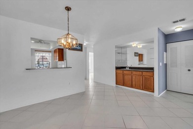 Highly sought after Capri Isles leads you to this amazing second on Capri Isle Golf Club in Florida - for sale on GolfHomes.com, golf home, golf lot