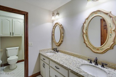 Discover this spacious 4-Bedroom, 2.5-bath home with at least on Castlewoods Golf Club in Mississippi - for sale on GolfHomes.com, golf home, golf lot